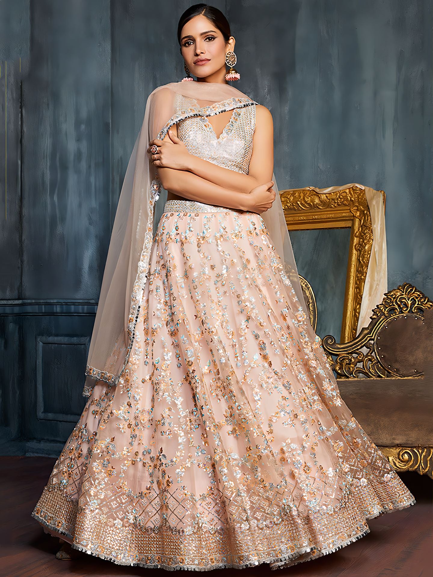 Peach Soft Net Sequins Embroidered Lehenga Choli Set
