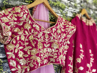 Pinkish Red Raw Silk Embroidered Bridal Lehenga Choli
