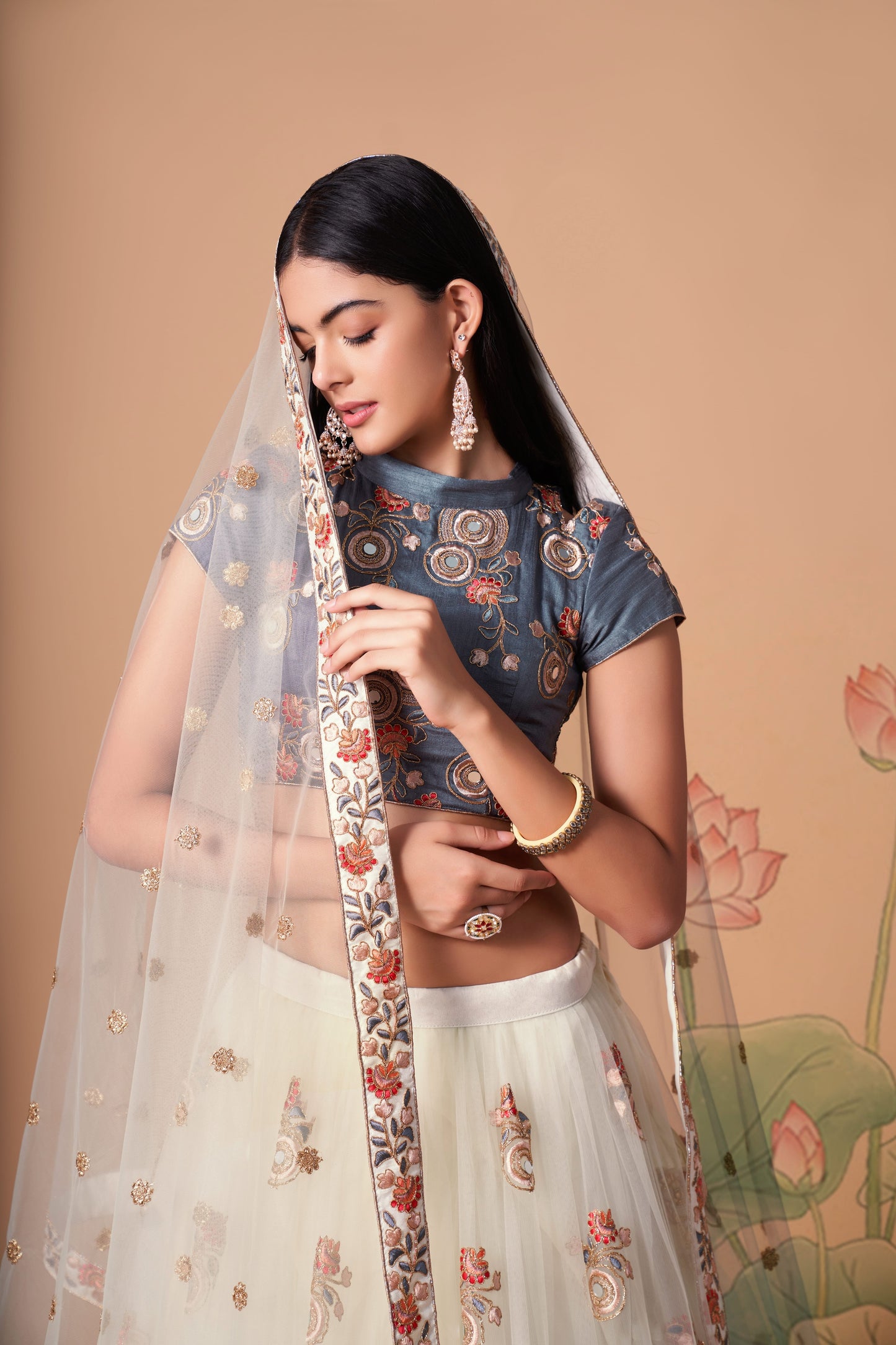 Off White Soft Net Mirror Embroidered Lehenga Choli Set