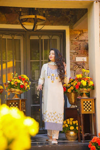 Elegant Off White Muslin Printed Suit Set